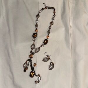 Brown toned necklace and earring set with beads and gems
